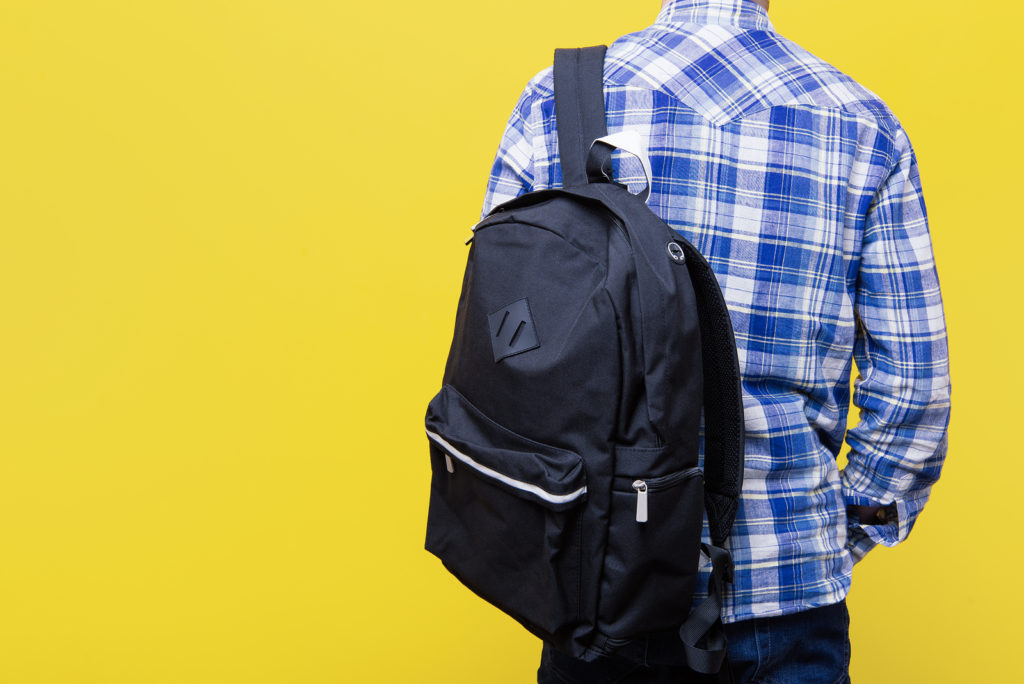 backpack over shoulder